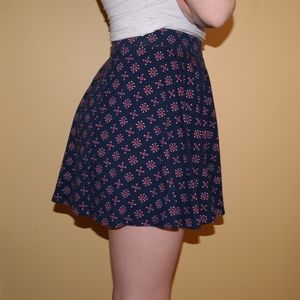 Blue, pink, and white patterned skater skirt.
